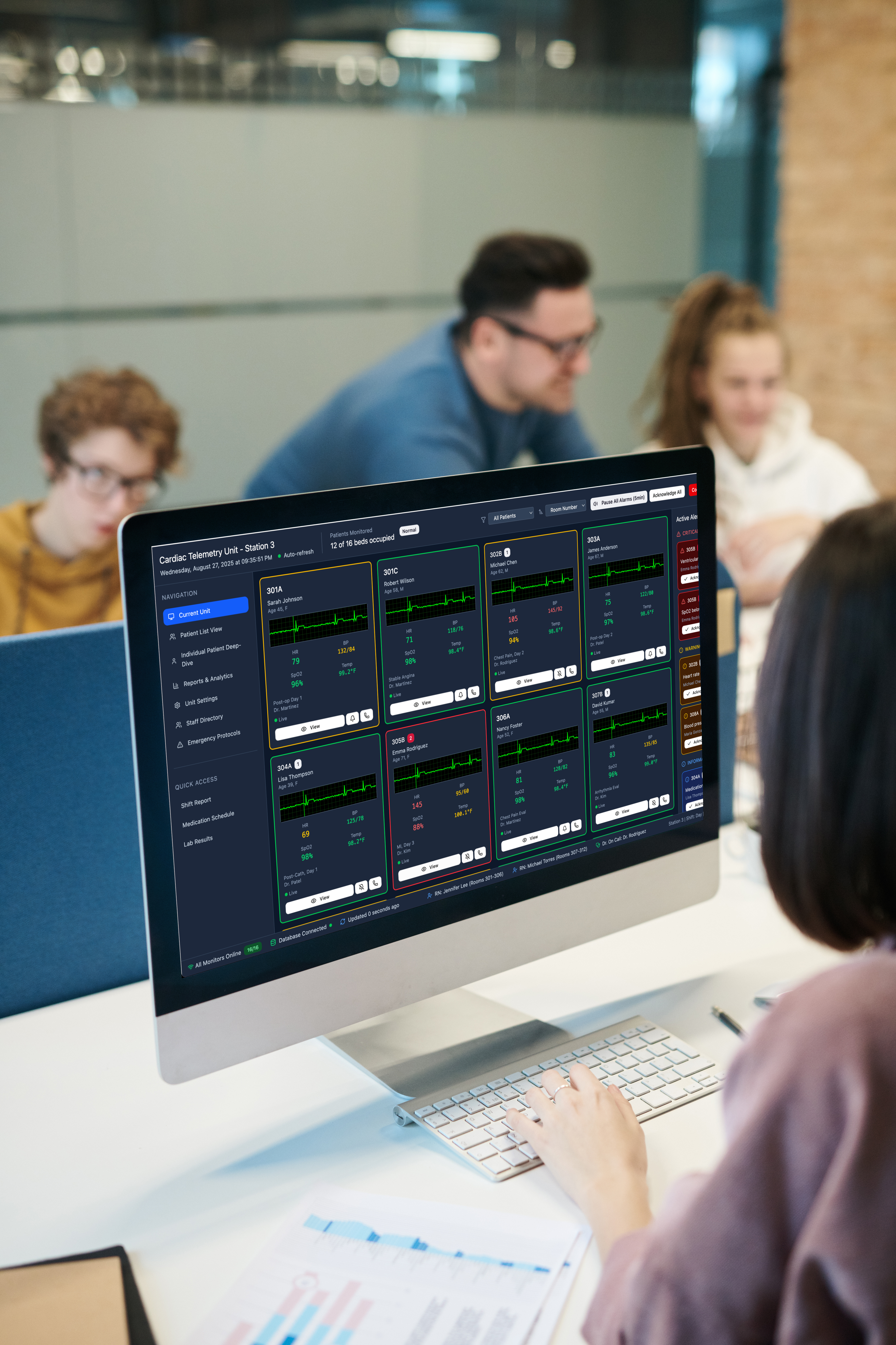 Clinician using web application interface for medical device monitoring